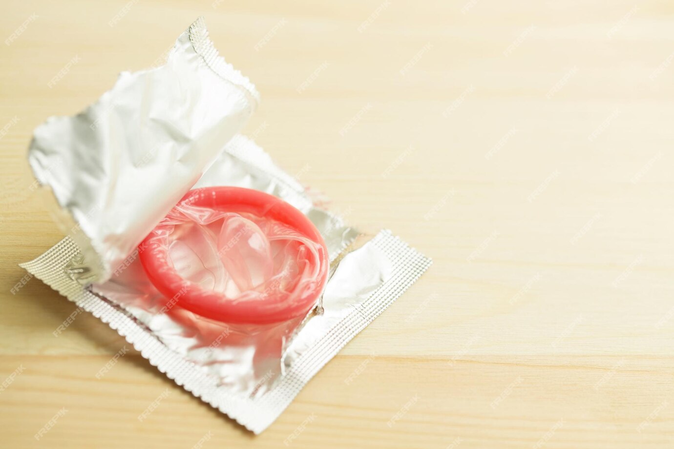 rozbalený prezervativ